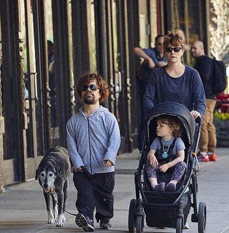 Erica Schmidt with her husband Peter Dinklage and their child 